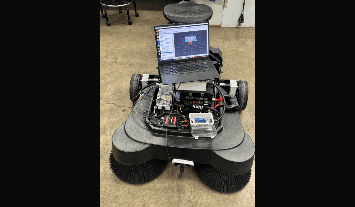 Industrial push sweeper converted into an autonomous mobile robot